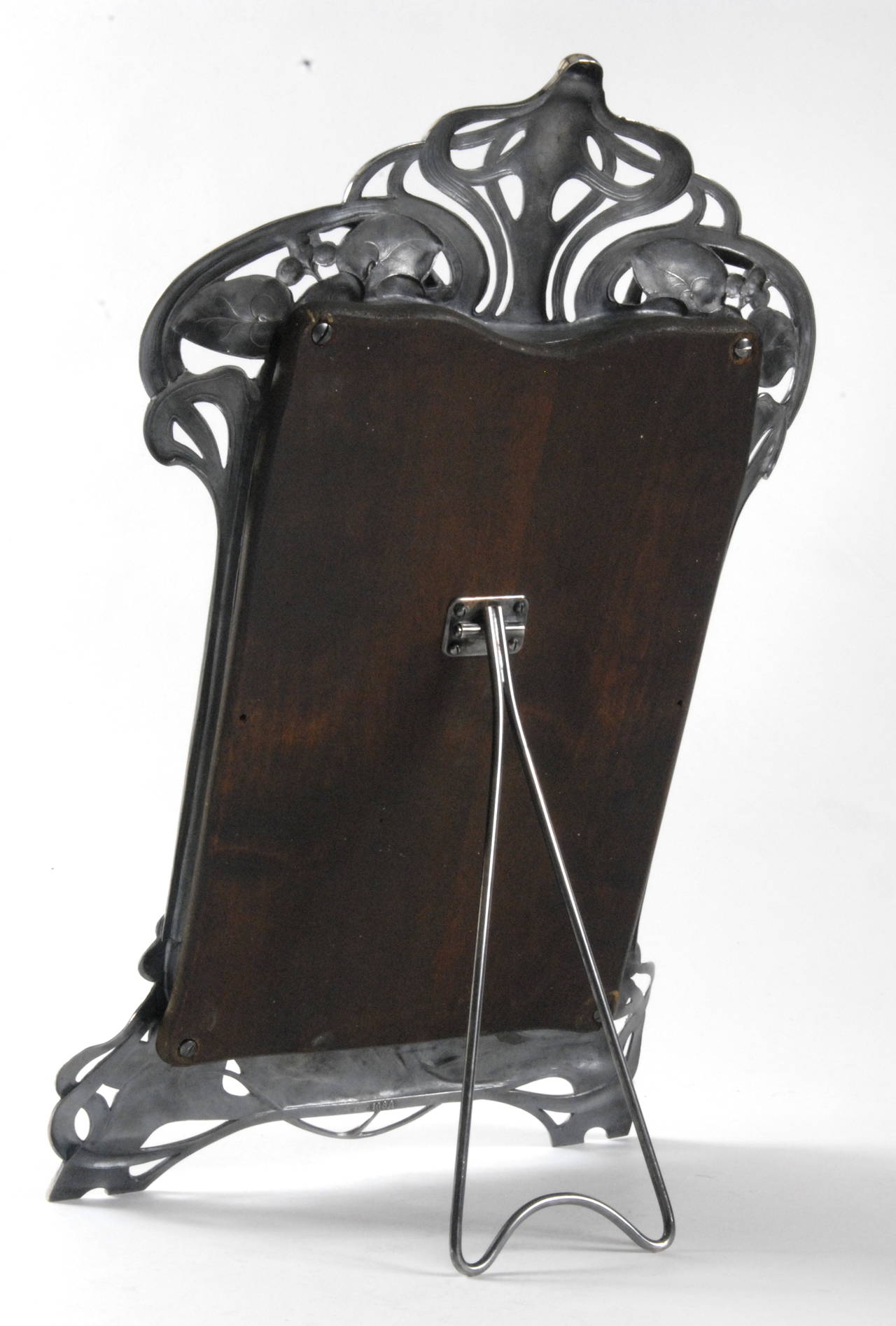 A WMF [Wurttembergische Metallwarenfabrik] toilet mirror, circa 1906, Germany, silver plated, pattern number 108a, as shown in photo. Original bevelled glass mirror and timber back, in near mint condition.