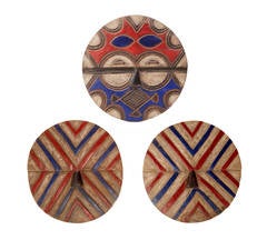Set of three Hand painted Red and Blue Wooden African Masks, late 19th century