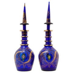 Pair of Antique Bohemian Enameled, Hand-Painted Blue Glass Decanters with Lids