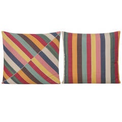 Pair of Yastik Shalimar multi- striped square cushions by Rifat Ozbek
