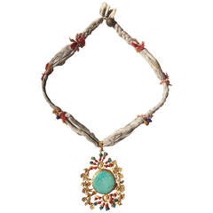 24-Carat Gold Necklace with Turquoise Stones and Pearls on Grey Silk