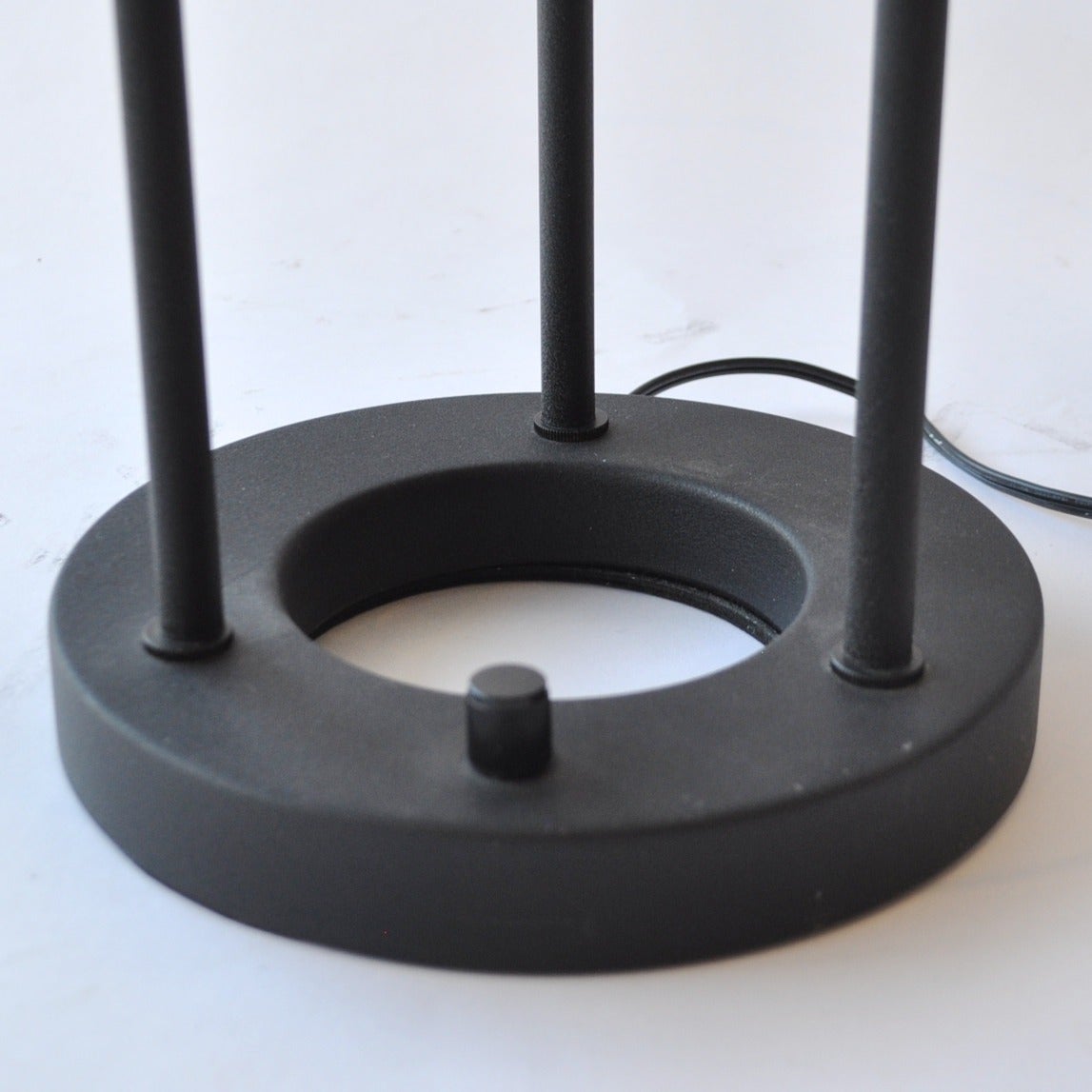 Robert Sonneman deigned holgen desk lamp for George Kovacs. Dimmer on bottom weighted donut base.