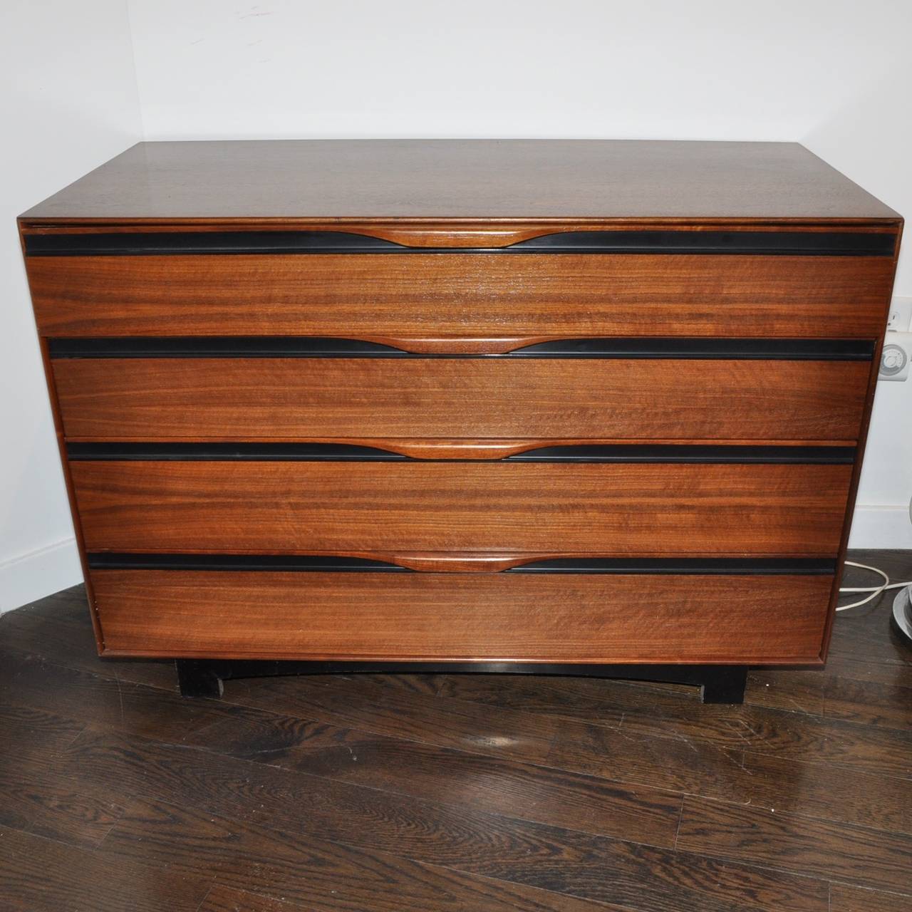 This dresser is manufactured in beautiful walnut with 4 drawers with integrated drawer pull and black edging. Each drawer interior comes with dividers which can be rearranged to suit your needs.