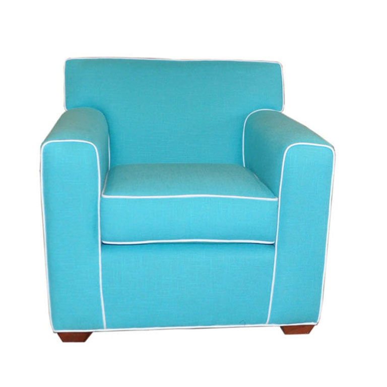 Classic club chair shape, deep and super comfortable, finished in a beautiful turquoise linen with white linen piping.