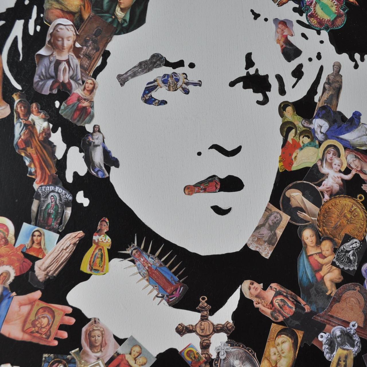 This innovative mixed media piece by artist Dennis Stevens uses images of the Virgin Mary (the Madonna) to portray the Queen of Pop, cultural icon Madonna. The piece is on wood.