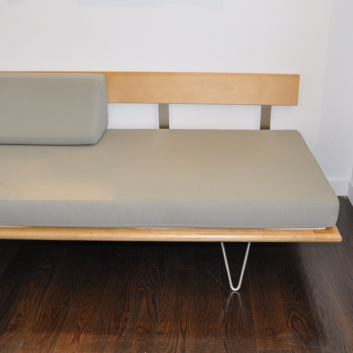 George Nelson designed an early version of this daybed for his own use in 1941. This version, with cushions and a backrest, resembles a cross between bed and sofa. Produced by Herman Miller from 1948 to approximately 1964.

The Case Study Daybed