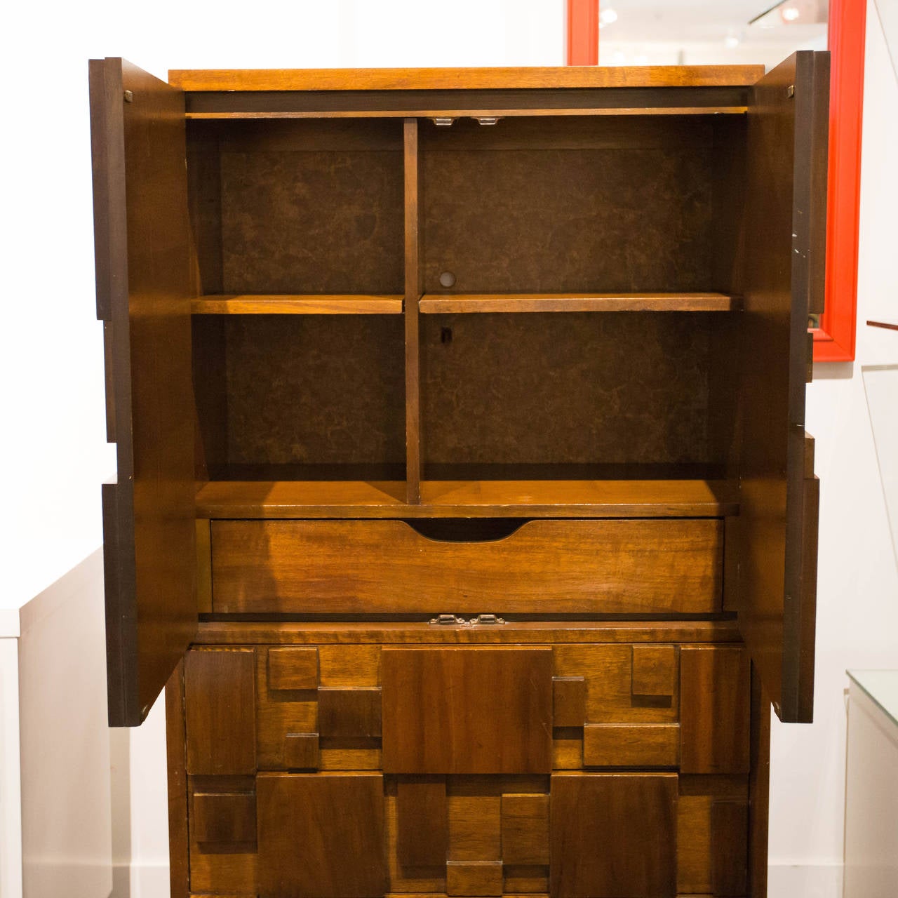 Mid-century Modern Brutalist Wardrobe by Lane. The top section has two doors which open to reveal open shelved storage and a single drawer. The bottom section consists of three big, deep drawers.