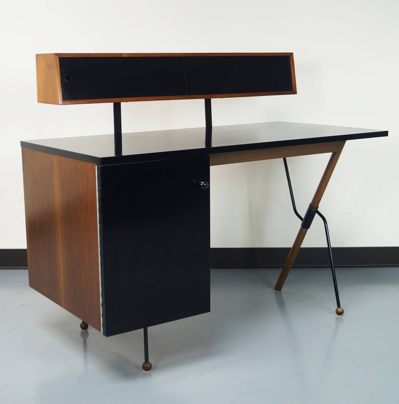 Vintage series 62 desk with a rare top storage unit designed by Greta M. Grossman for Glenn of California. Original finish. Engraved with original manufacture label.