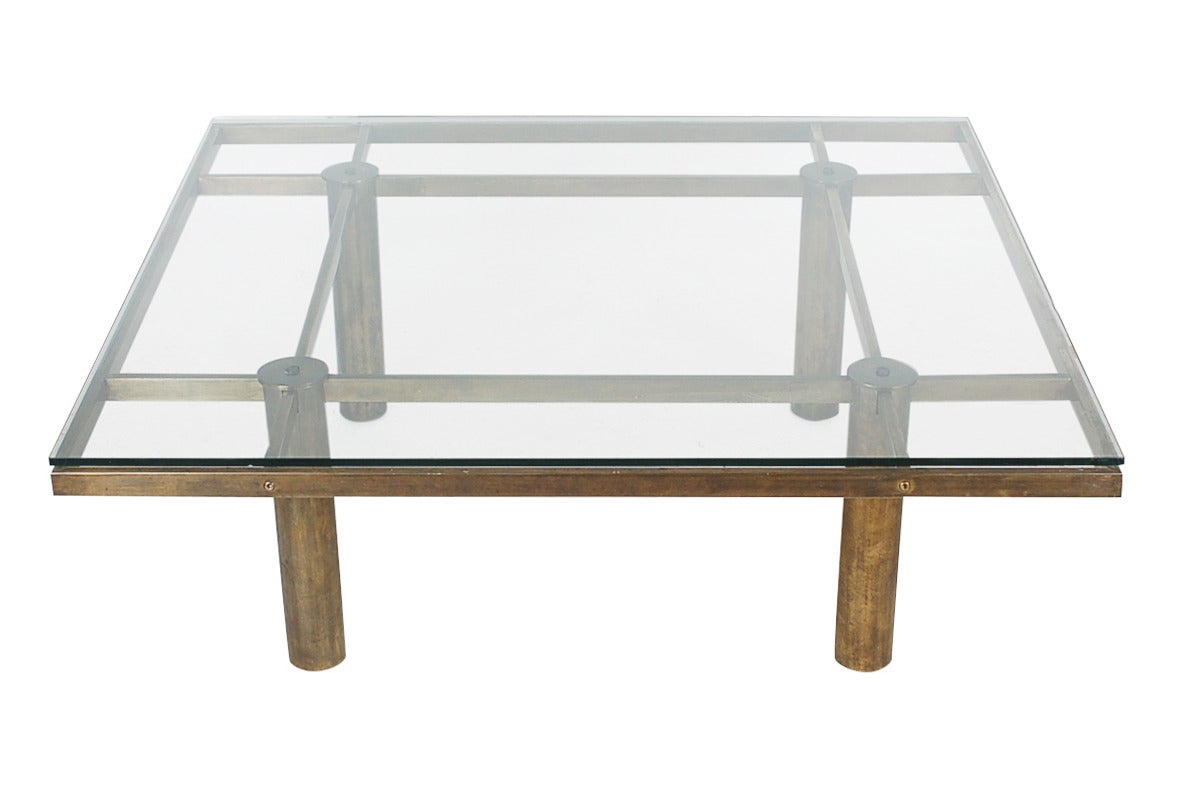 A classic grid designed coffee table by Afra & Tobia Scarpa and produced by Knoll in the 1970's. The table has an antique brass or bronze finish which is very uncommon.