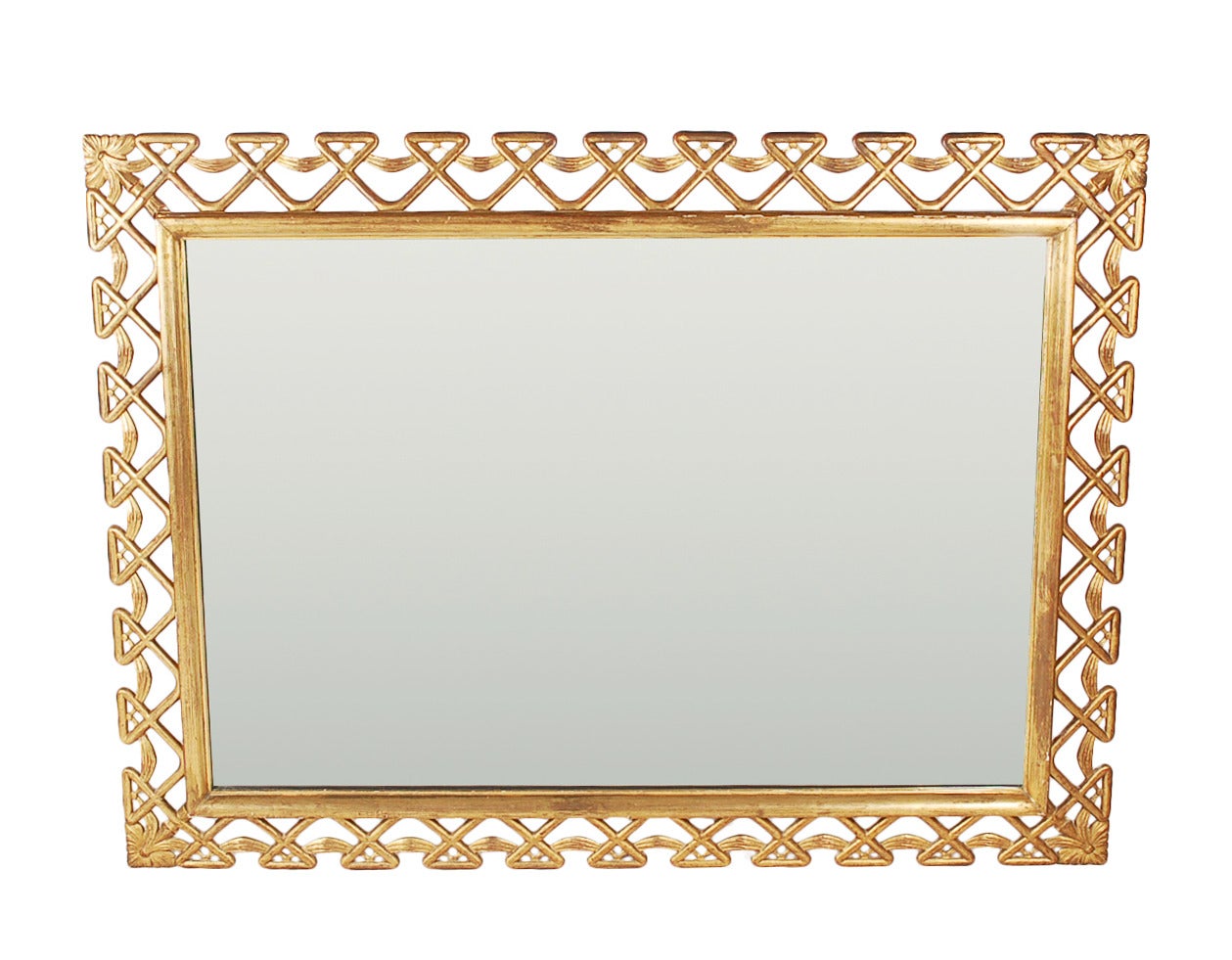 A strikingly glamorous Hollywood regency framed wall mirror that will add class to any room. It features an intricate gold gilded wood frame and nice size original mirror.