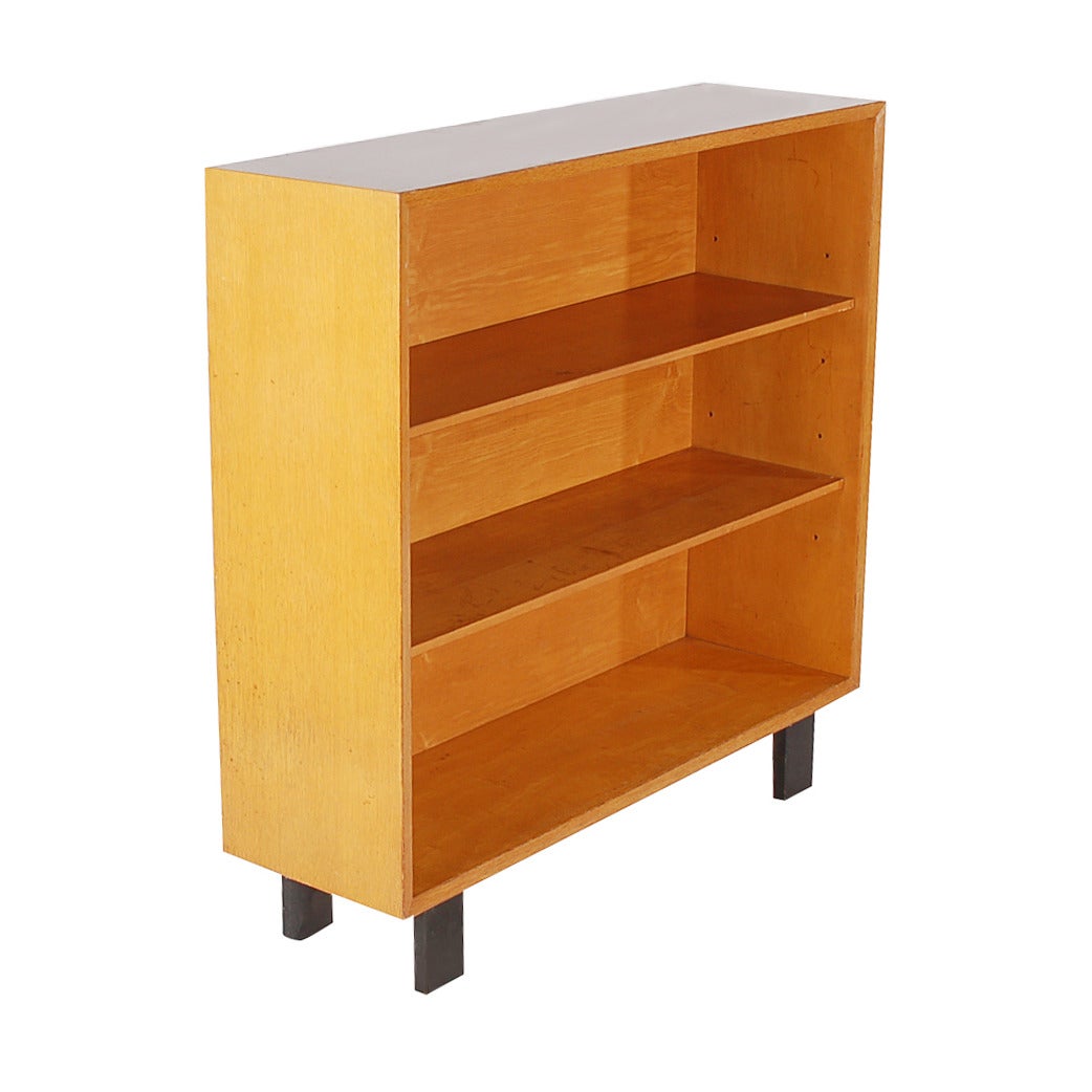 A nice size bookcase designed by George Nelson for Herman Miller. Maple wood construction with ebony legs. (Unmarked).