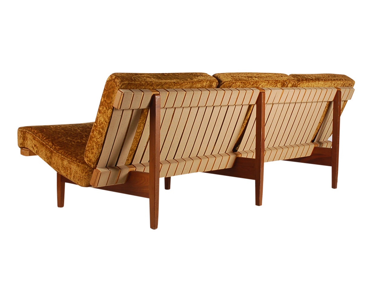 A great design from the mid-1950s that you just don't see that often. A Classic strapped sofa by Lewis Butler and produced by Knoll Associates. 

Very reminiscent of Jens Risom & George Nelson designs.