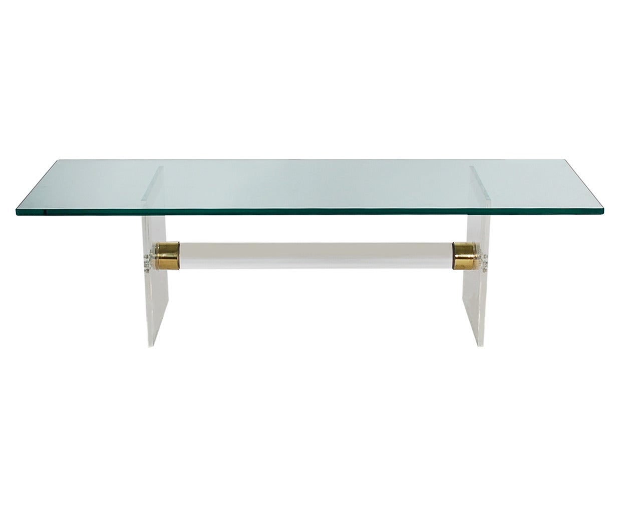 A long narrow coffee table in the manner of Karl Springer. Very thick high
quality Lucite with heavy glass top.