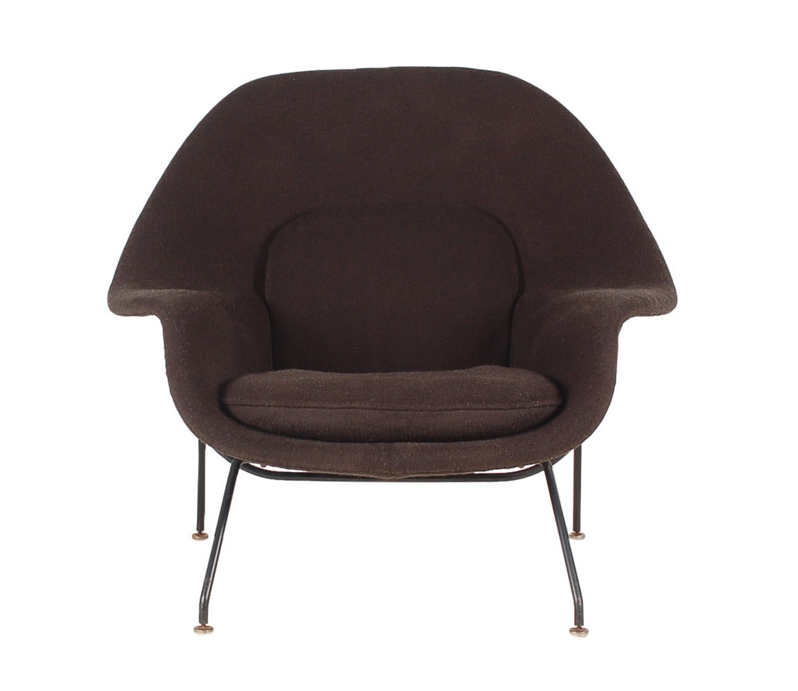 A very early 1950s example designed by Eero Saarinen and produced by Knoll. Very desirable black metal frame with original black tweed upholstery.