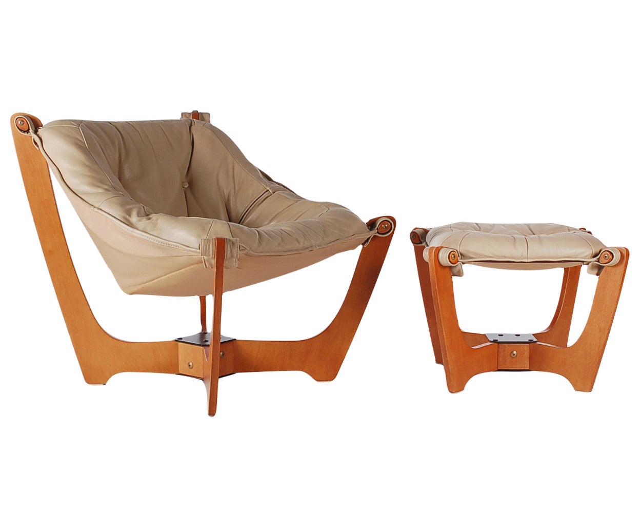A vintage Luna chair designed by Odd Knutsen and produced in Norway. The chair features a teak frame and cream aniline leather sling. Ottoman measures: H 15.5, W 21, D 21.

In the style of: Ingmar Relling, Westnofa, Danish Modern.