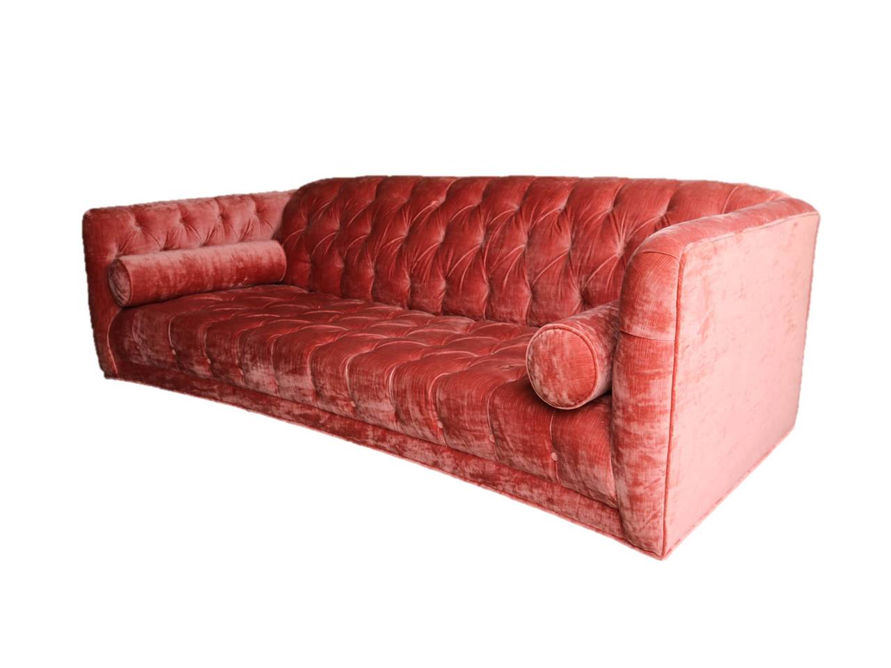 For your enjoyment - a lovely vintage Chesterfield sofa covered in its original salmon pink slub velvet.  Four dark walnut legs are set back as to be invisible to viewer.  Sofa is sturdy and sound.  Foam is soft and velvet is in very good condition,