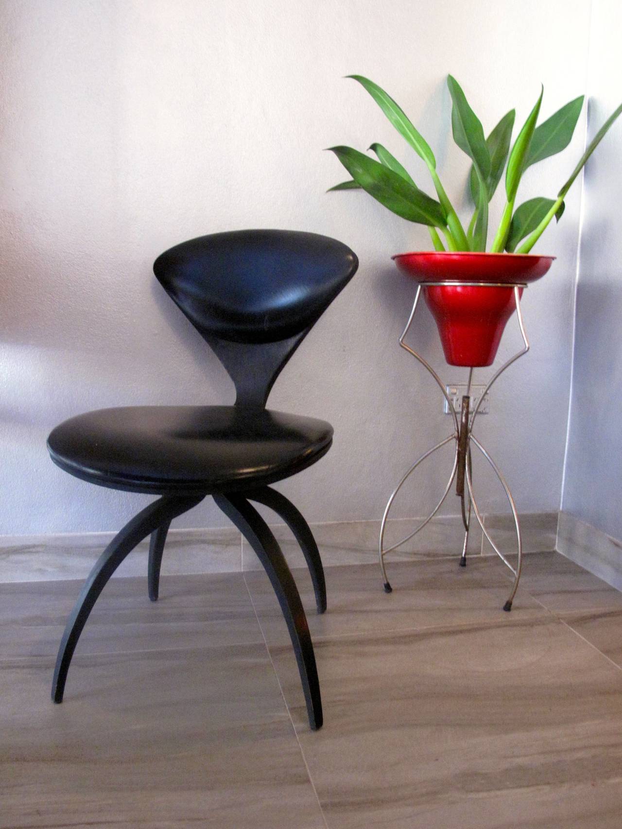 Black lacquered bentwood frame with original upholstered seat and back rest.