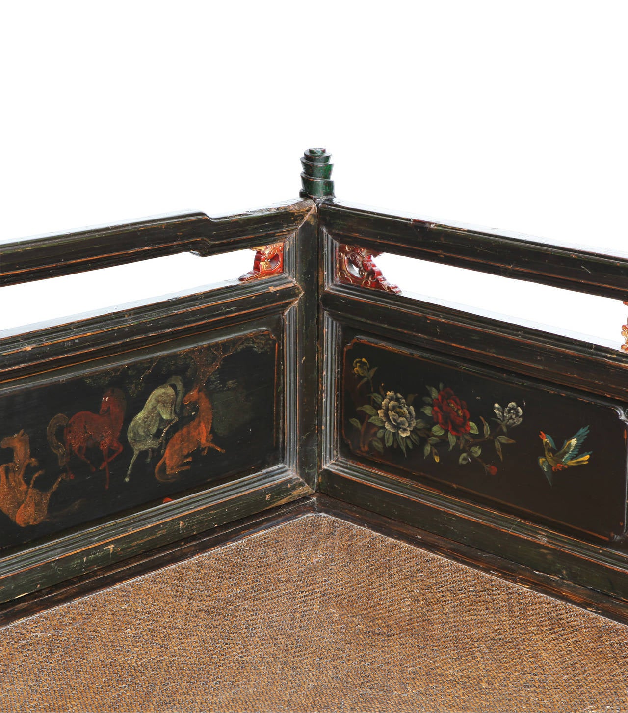 Beautiful Chinese opium bed, dating from Qing dynasty. The panels of backrest are hand-painted with flowers, landscapes, horses and scenes of everyday life. The seat is made of rattan and at the bottom there is fine decoration carved with