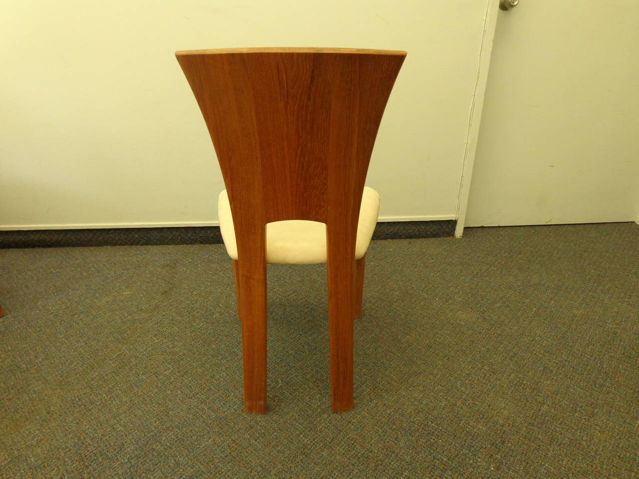 Set of four Koefoed teak dining chairs from the Flip, Flap and Sophie set. Matching table also available.
