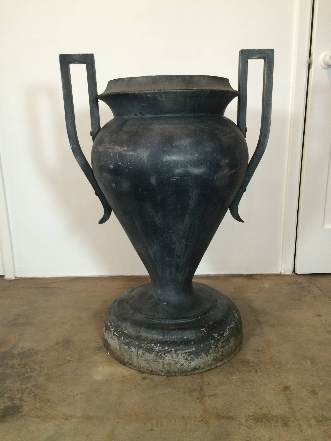 Very large iron urn, excellent for an entryway or garden. Very heavy, very solid.