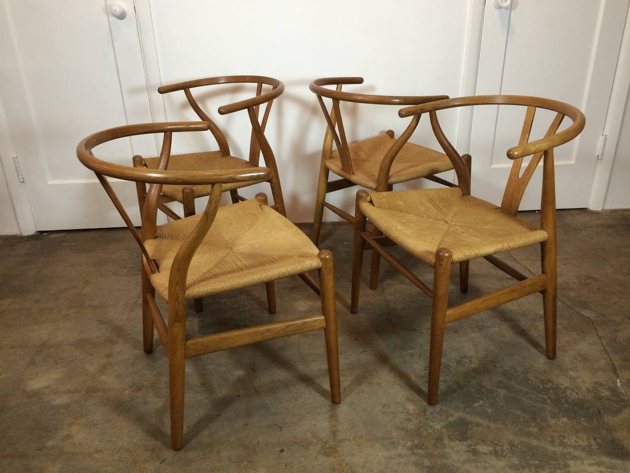 Set of Four Early Production Wishbone Chairs by Hans Wegner at 1stDibs