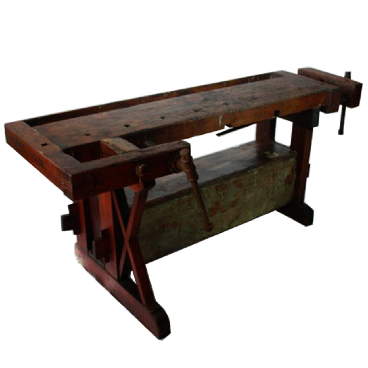 Rustic workbench with two working cast iron vices, built in toolbox and tool caddy running the length of the workbench. Made in Denmark, circa late 19th century.