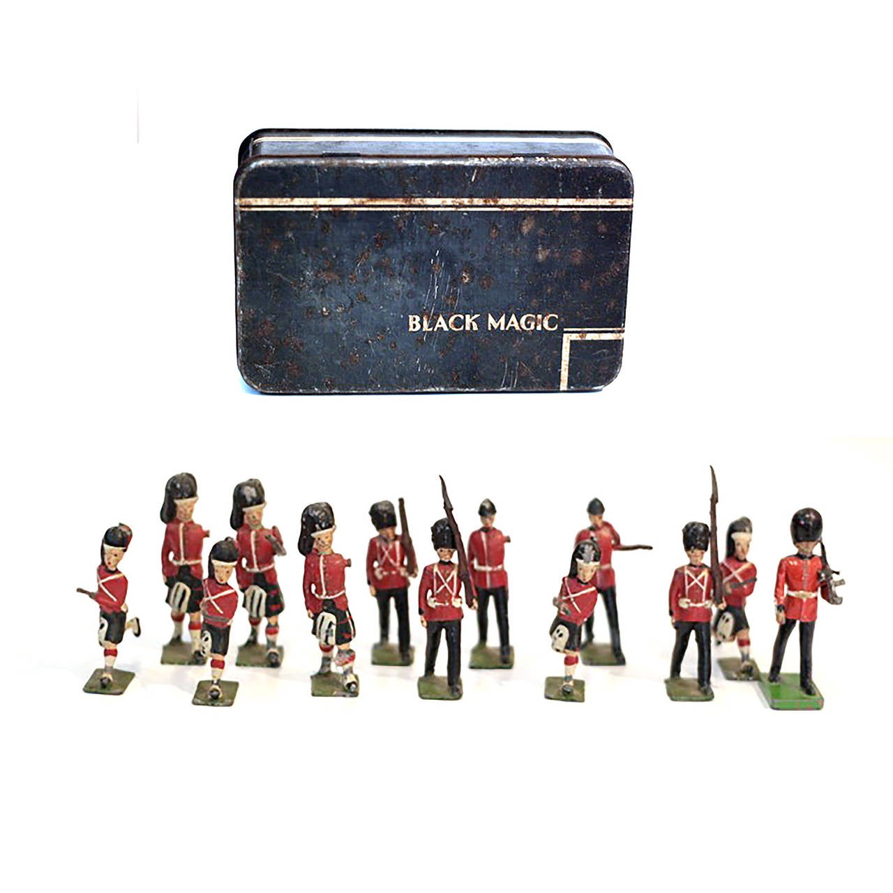 Collection of 13 painted lead toy soldiers. Made in England. Circa midcentury.