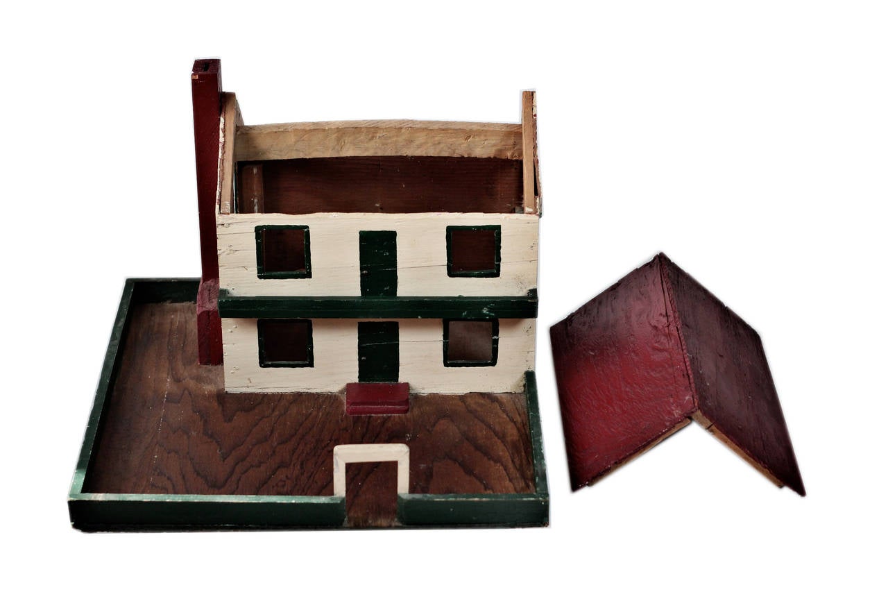 Hand painted wooden model house and courtyard, circa 1920. Removable roof. Internal porcelain light socket, can be illuminated.