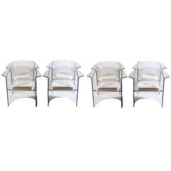 Eight Lucite Dining Chairs in the Style of Laverne