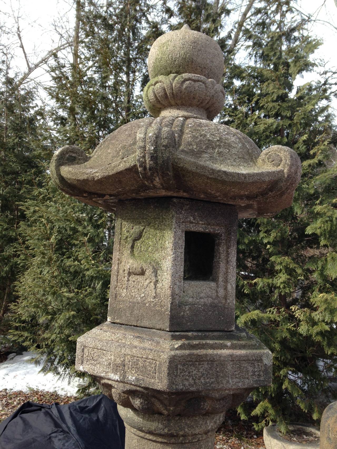 Japan, a classic hand carved stone  Kasuga lantern, 210cm, 7 feet high, solid granite,  Meiji to Taisho period, (1900-1926 CE)

The monumental and well proportioned carved stone Kasuga style lantern fashioned in six parts with an incised finial