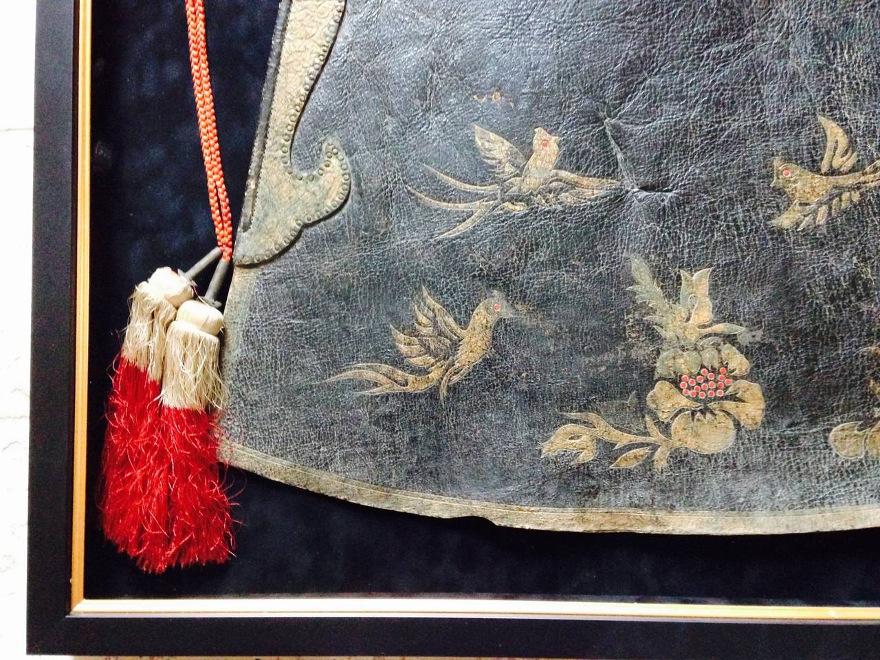 Japan, a framed leather Samurai horse parade saddle cover aori, 19th century