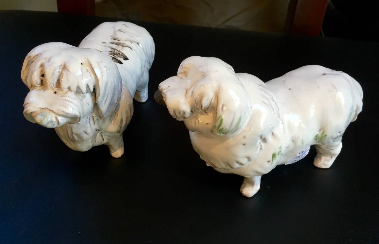 Japan, pair charming Japanese ceramic sheep dogs, studio works of art. Hand-formed, hand-painted, likely unique, circa 1930s-1950s.

Lifetime Guarantee of Authenticity: All of our Asian works of art come with our Lifetime Authenticity