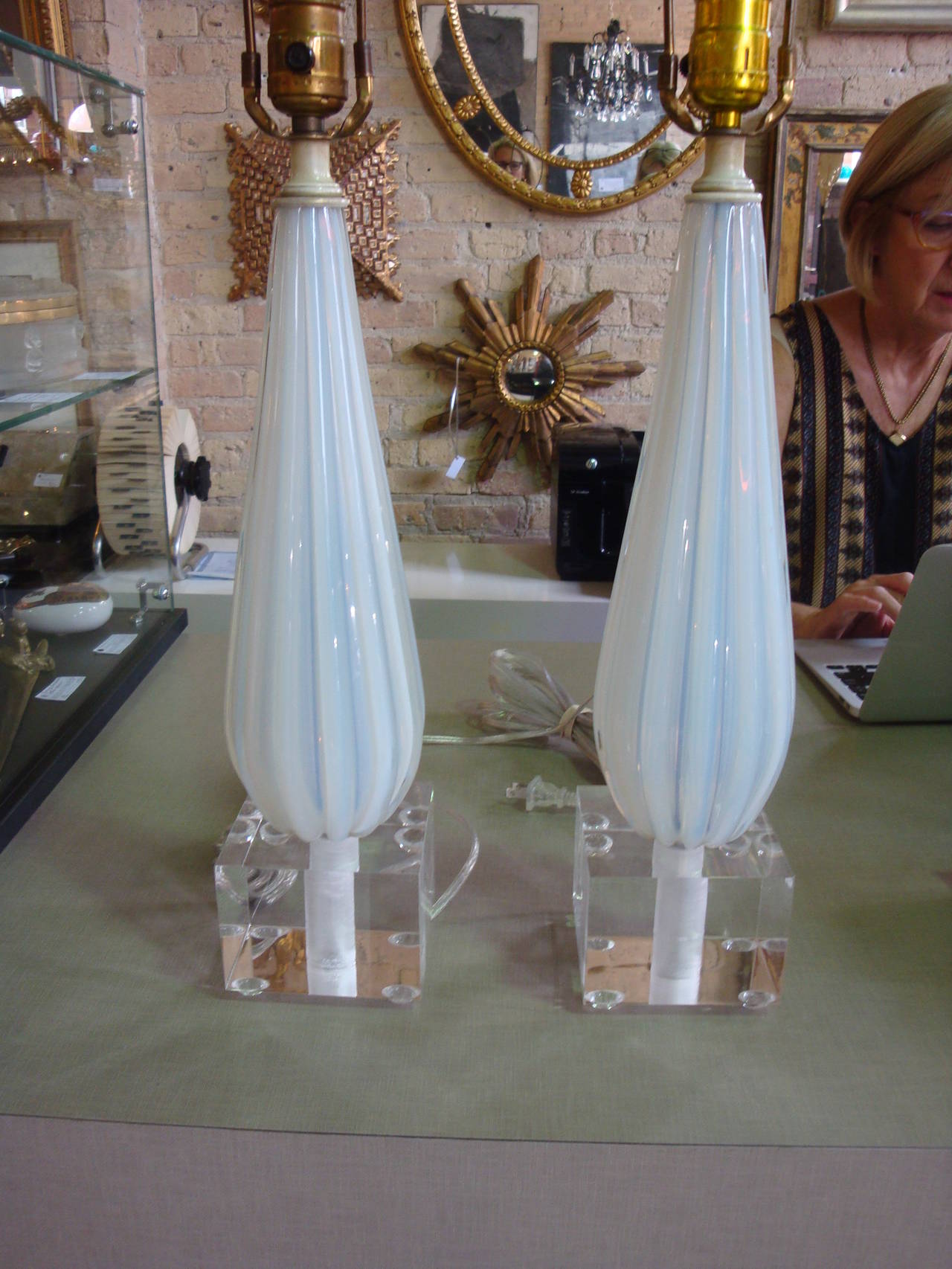 This is a pair of vintage murano lamps that were custom made with lucite bases