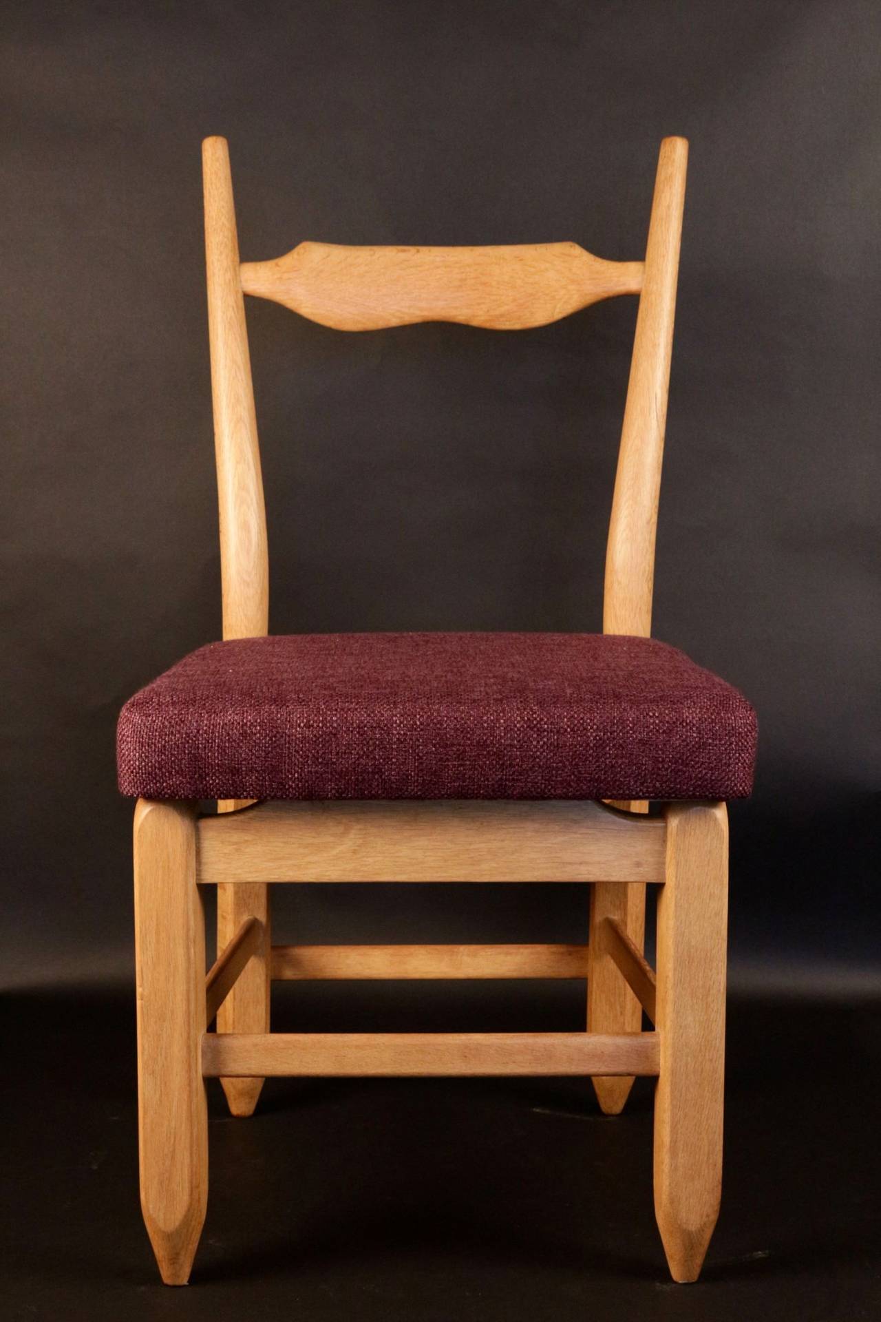 Set of five natural solid oak chairs. The seats have been fully reupholstered according to the original condition (fabric by House Houles). These chairs were designed by Guillerme et Chambron whose workshop was in Lille - France. 1955s-1960s