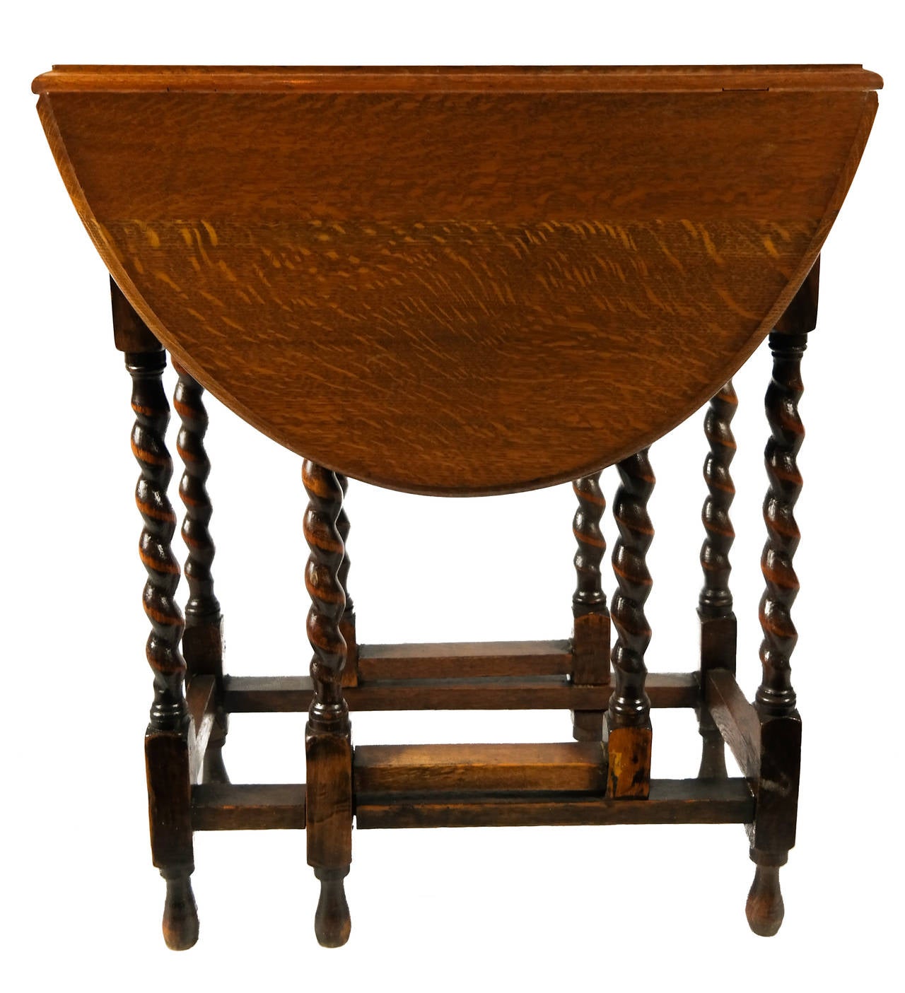 Oak gateleg table on barley twist legs, English, ca. 1920s

Depth without leaves: 11.5