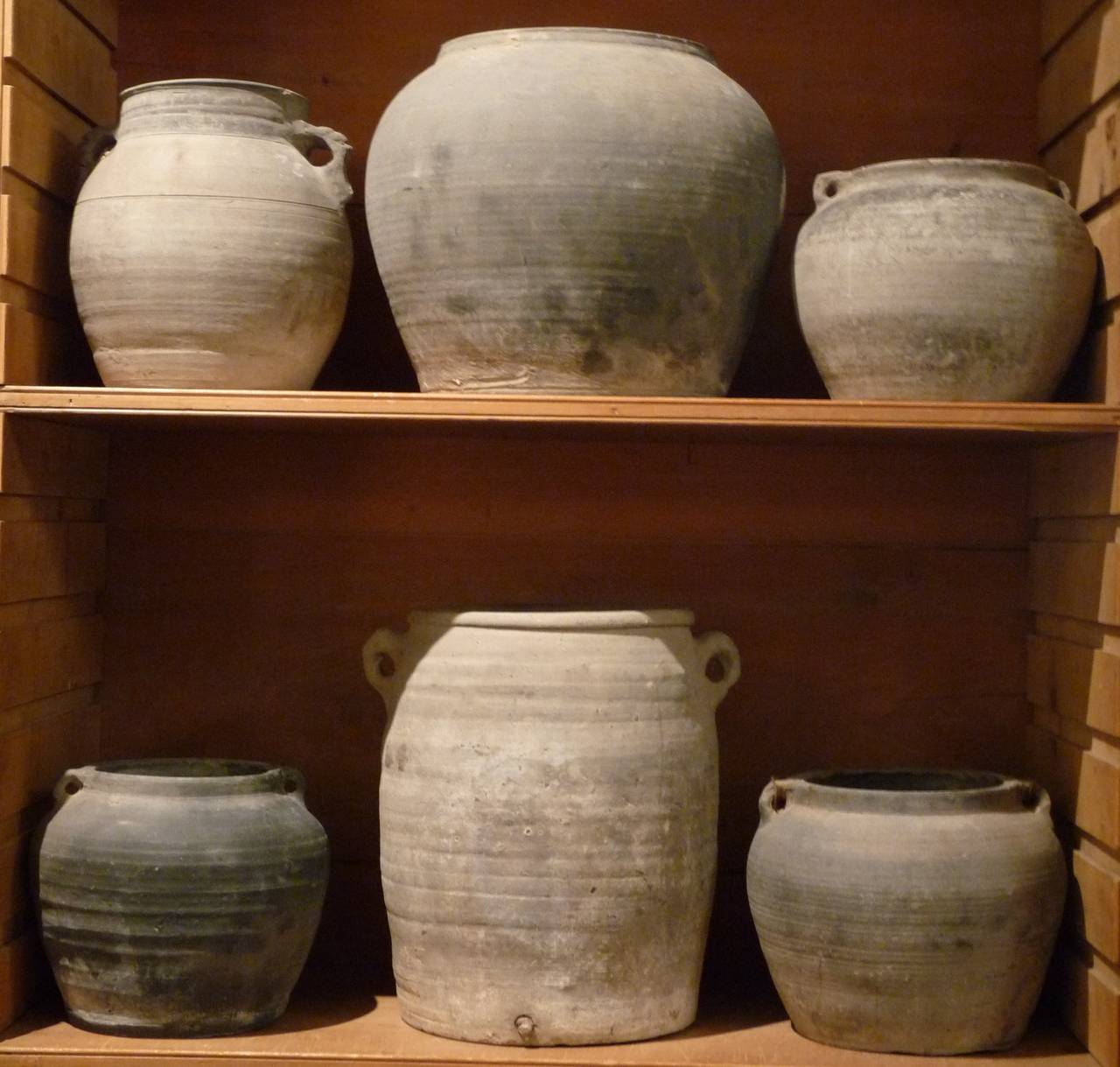 Wonderfully crafted 19th century Chinese pots in varying sizes are a great accent piece.  

Please note that each pot is entirely unique and a different size, shape and color.  Please contact us if you would like further detail on each piece.