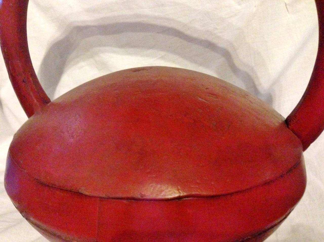 Beautiful red lacquered basket has a very unique dome top. The 