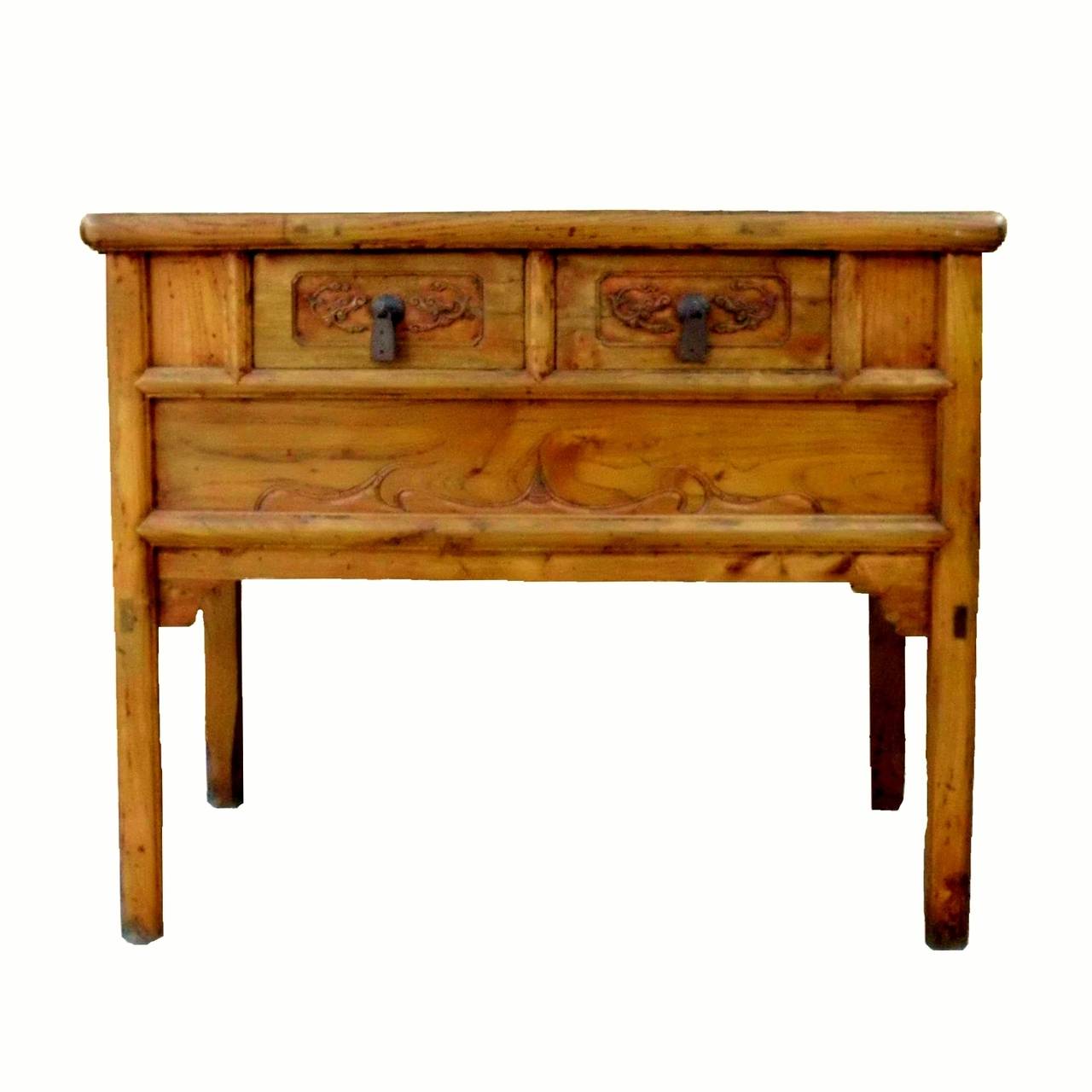Elmwood with beautiful grains such as the ones on this table are prized in the 19th century furniture making. This natural color table features two drawers carved with the dragon motif. Secret compartment under the drawer is original to the piece.