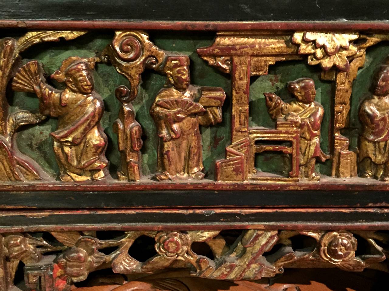 Rare, beautiful Box has an elaborately carved and gilded cover. Carvings depict a scholar's life with books and opera. Pomegranates and peaches on the ends symbolize family and long life. The cover is carved from a single block of wood. The base