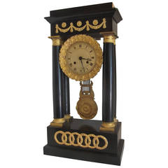 Antique French 1st Empire Ebonized Portico Clock with Ormolu Mounts