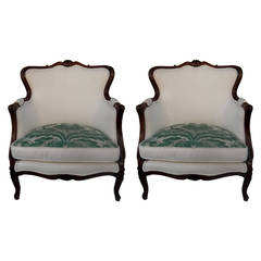 Pair of French Carved Walnut Framed Bergere Chairs