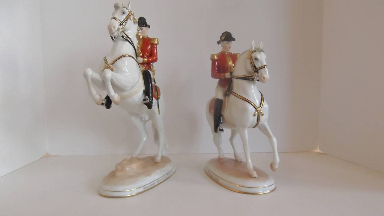 Vienna Augarten Horse Levade Spanish Riding School Figurines Made in Austria, Wien Porcelan, all hand painted and hand gilded.
 Lipizzaner Wien Porcelain Soldiers on Horses, both with red coated Spanish Riders. Hallmarked by Augarten Vienna, Blue