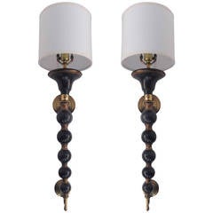 A Pair of Mid Century Torch Sconces