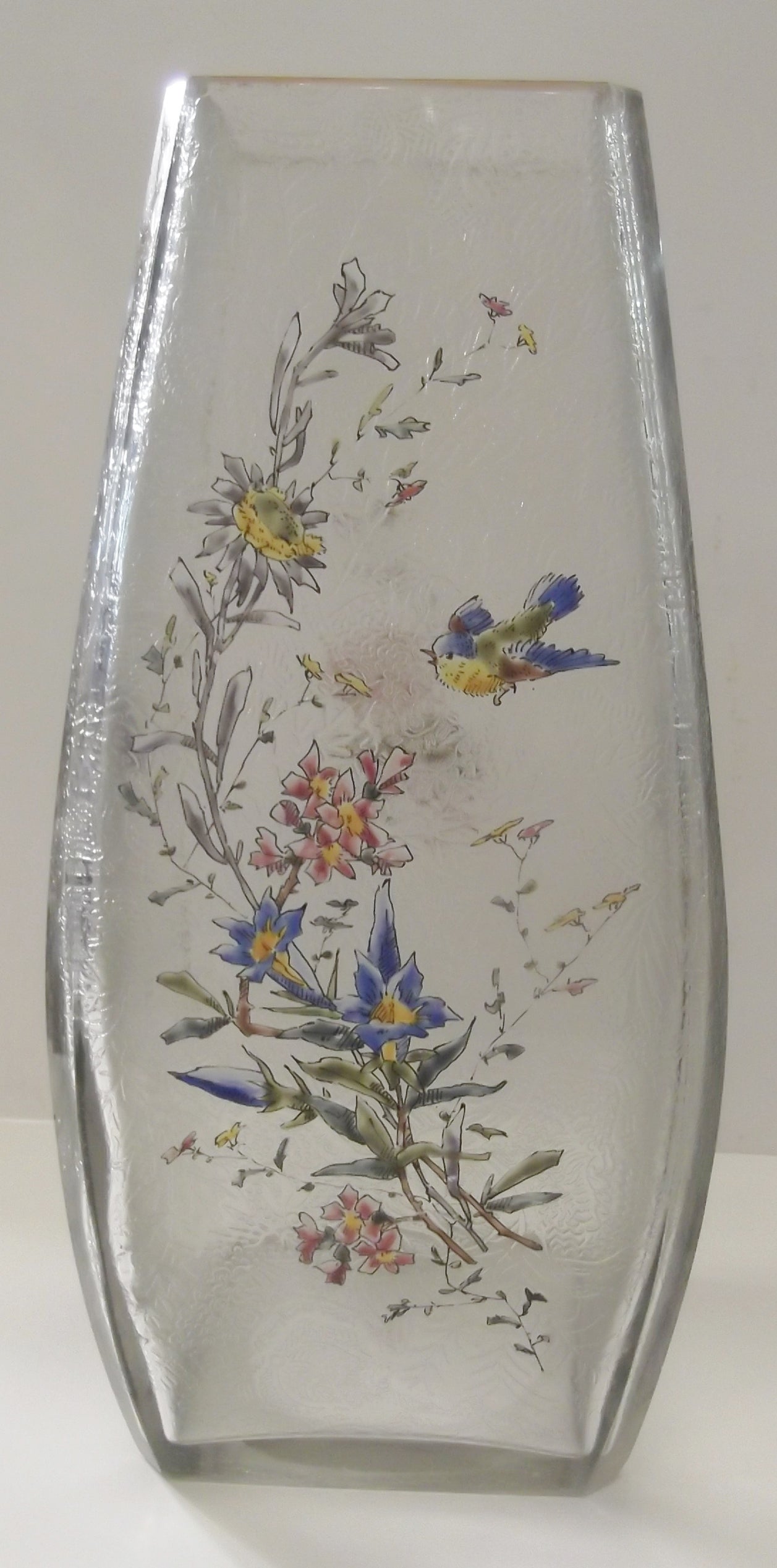 A fine pair of Mont Joye French acid etched glass and enameled rectangular tapered vases.
The interior is acid etched design, with the exterior hand enameled with birds, floral branched and butterflies mainly on the fronts, small sprigs on the back