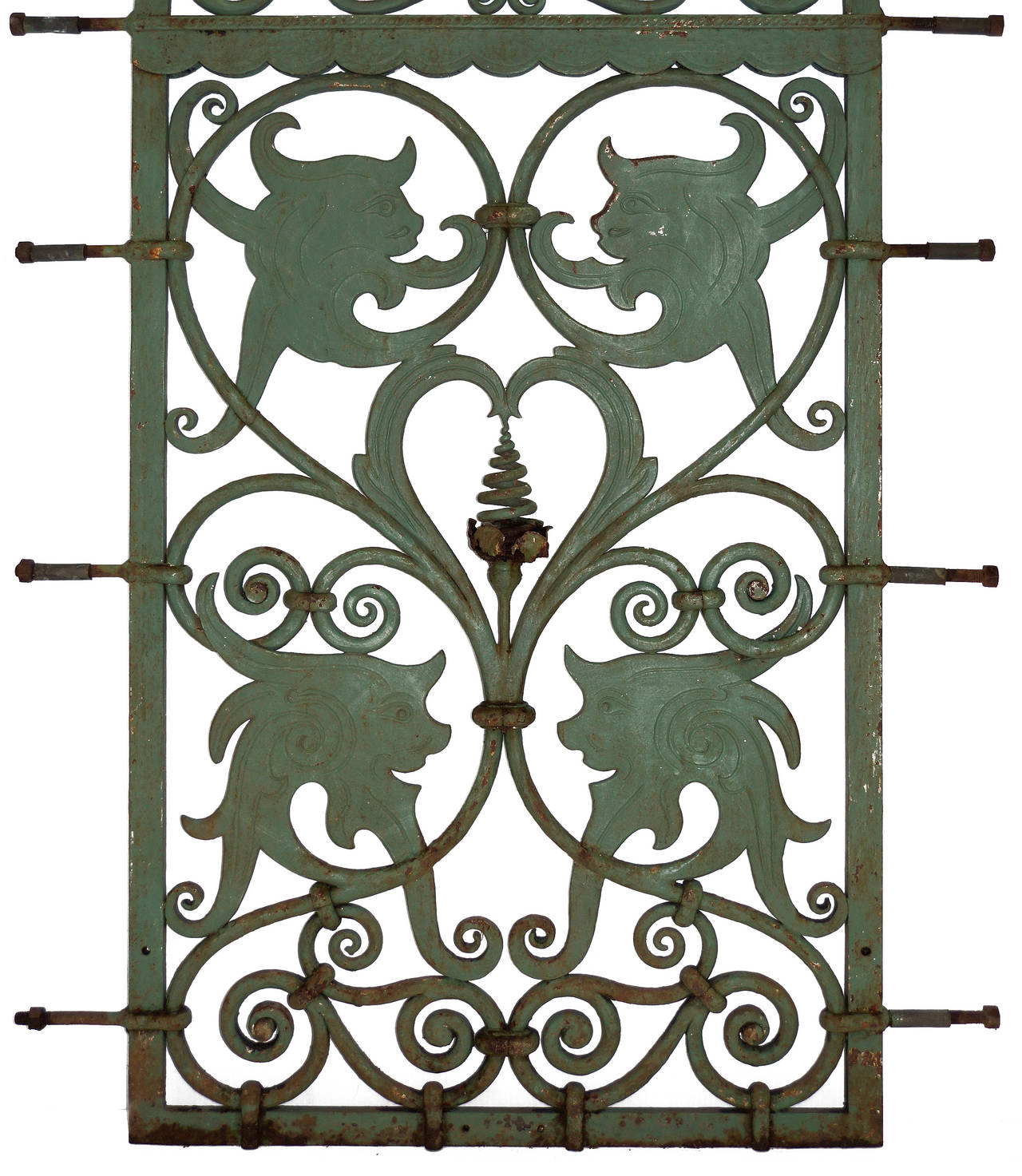 Gothic Revival unique and nicely patinated double sided ornamental wrought iron window guard having finely done scrollwork, mascarons and original monogram at top, circa 1870. 
35