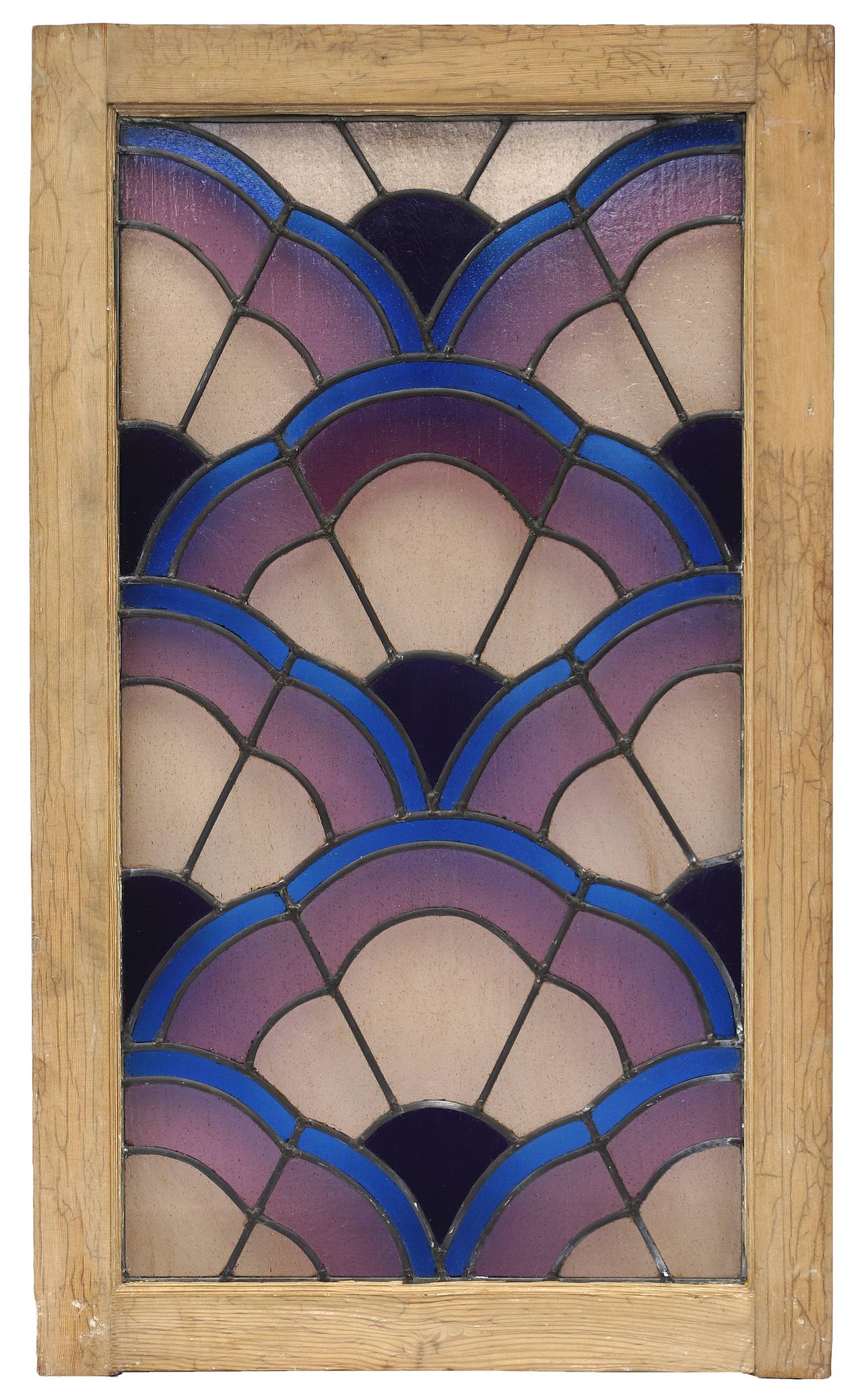 Italian Art Deco stained glass window panel having overlapping polychrome scale motif in the original wood frame, circa 1930. There is a minor crack in the lower purple side panel, please see last photo.