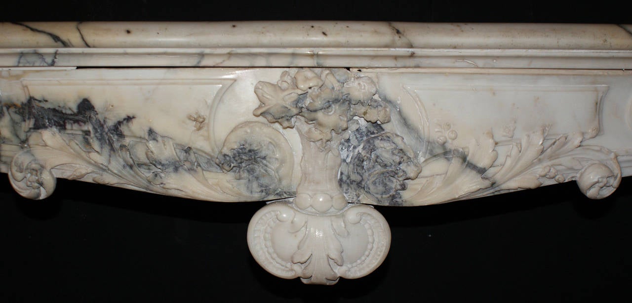 Hand-Carved French Louis XV Fireplace Mantel in Italian Pavonazzo Marble, circa 1740 For Sale