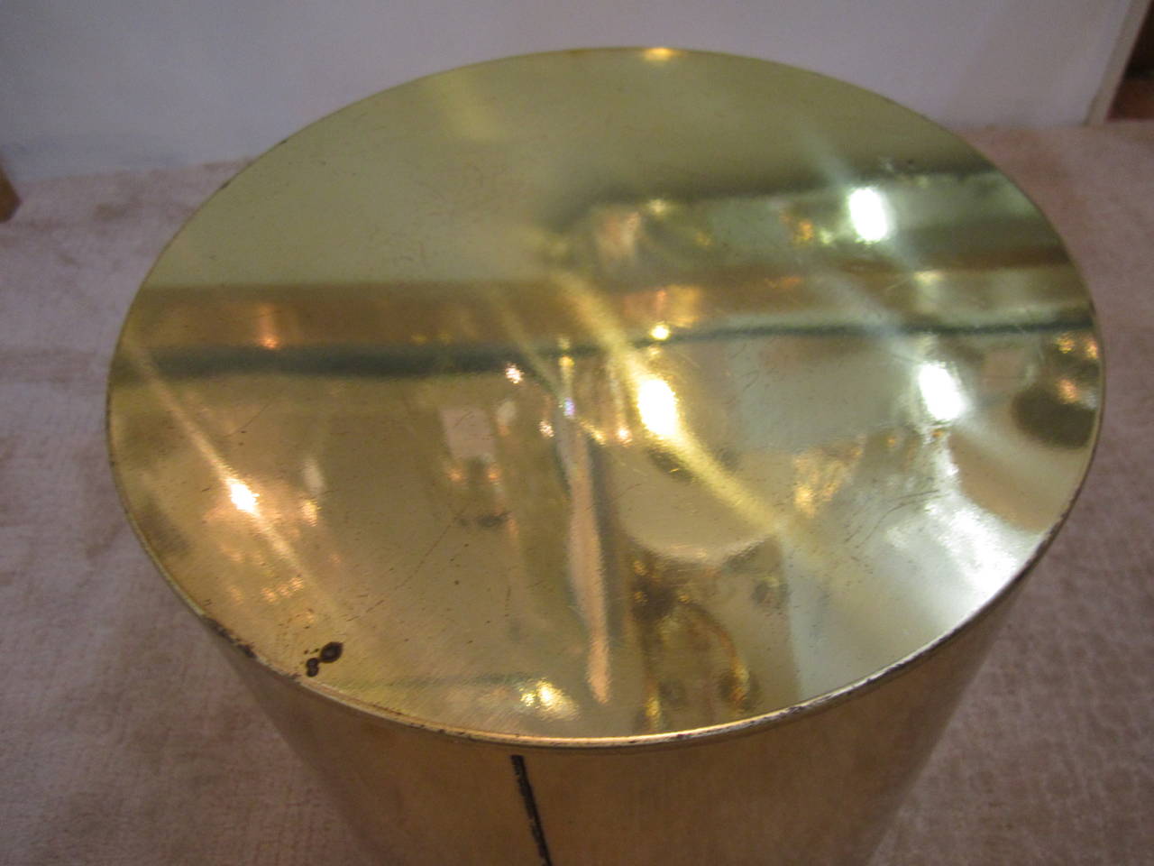 1970s modern brass drum side or end table designed and signed
by C. Jere. This single brass drum side or end table is made by the American company Artisan House. Item available here online, and by request, can be made available at my showcase space