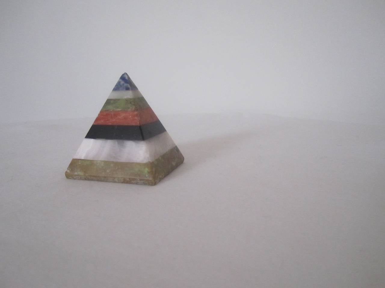 A very chic vintage layered multi-stone pyramid including Blue Lapis and Black Onyx. Six natural stones in all. Flea-bite nick at top. Could make a great paperweight, desk, table or bookshelf accessory. 

Available here online, and at my showroom