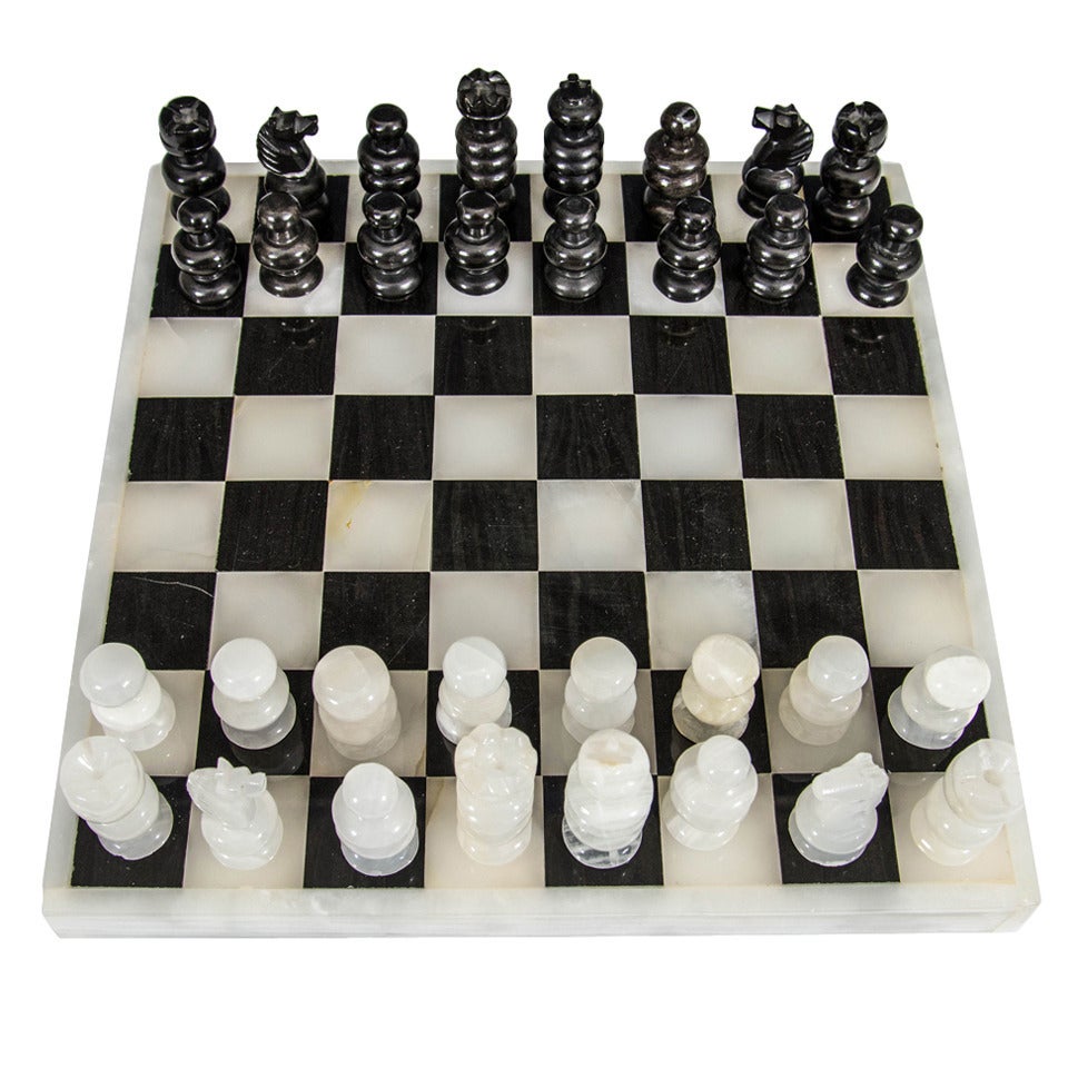 Vintage Italian black and white marble and onyx double-sided game board for chess, backgammon, and tic-tac-toe, with onyx and marble pieces. Good vintage condition with age appropriate wear to pieces.

Item available here online, or at my showroom